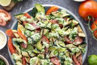 Smoky Grilled Zucchini and Heirloom Tomato Salad with Creamy Avocado-Scallion Dressing