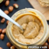 Maple Vanilla Peanut Butter Perfection 8 A small jar of homemade maple vanilla peanut butter.