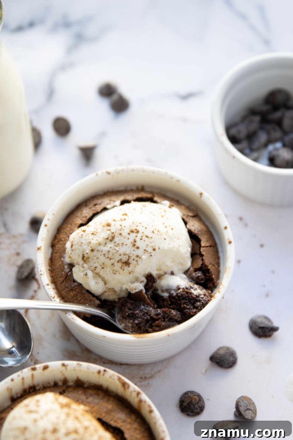 Decadent Mini Deep-Dish Brownies 2 These mini deep dish brownies bake up perfectly fudgy and are incredible served warm with a scoop of vanilla ice cream in the center! Perfect for a romantic dessert for two.