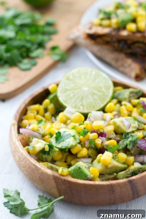A person carefully dicing avocados for salsa, highlighting the importance of kitchen safety