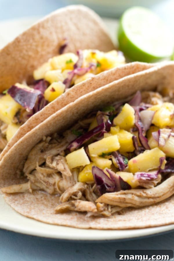 Slow-Cooked Jerk Chicken Tacos with Tropical Pineapple Slaw 5 Sweet and Spicy Slow-Cooked Jerk Chicken