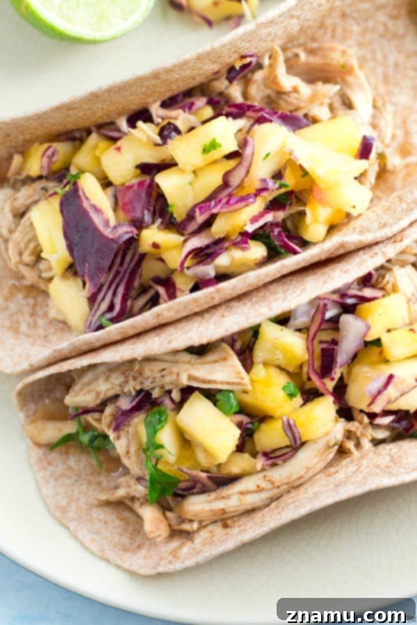Slow-Cooked Jerk Chicken Tacos with Tropical Pineapple Slaw 10 Delicious Slow-Cooked Jerk Chicken Tacos ready to eat