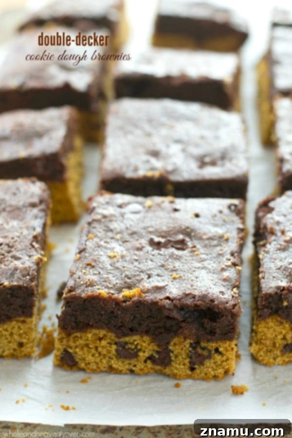 Thick layered double-decker cookie dough brownies, a perfect fusion of fudgy brownie and chocolate chip cookie
