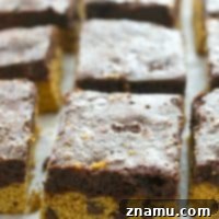 A single piece of Double-Decker Cookie Dough Brownie
