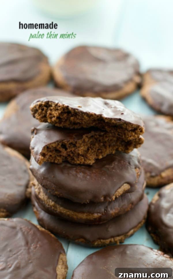 Grain-Free Mint Chocolate Wafers 2 A stack of homemade Paleo Thin Mints, coated in chocolate, ready to be enjoyed. They look like the classic Girl Scout cookies but are healthier.