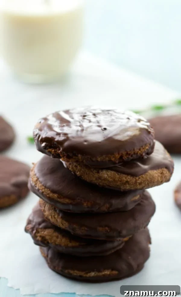 Grain-Free Mint Chocolate Wafers 10 A final close-up of a stack of homemade Paleo Thin Mints, showing their delicious layers and inviting texture, ready for a bite.