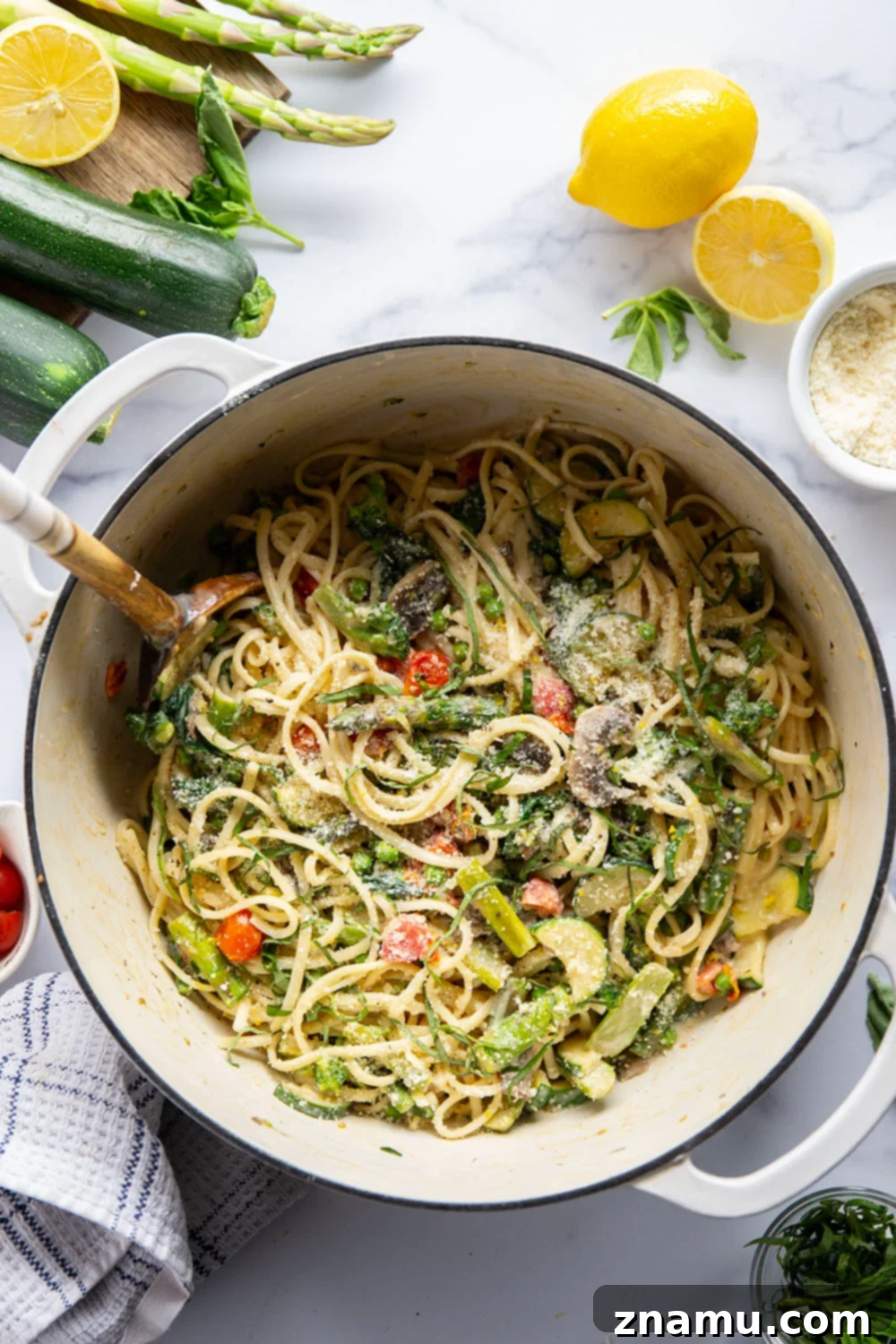 Vibrant Garden Pasta for Spring 4 A serving of Spring Pasta Primavera showcasing the creamy sauce clinging to the fettuccine and a generous mix of fresh vegetables.