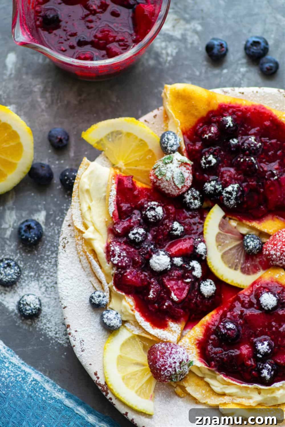 Berries & Cream Cheese Crepes 5 A stack of perfectly cooked, lacy crepes ready to be filled
