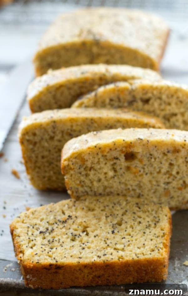 Supremely-moist inside and loaded with lemon and poppyseeds, this stunning quick bread is a perfect springtime treat. The sweet lemon-y glaze on the outside is unbelievable!