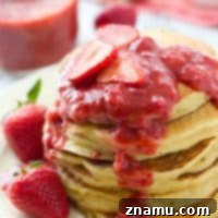 Orange Greek Yogurt Pancakes with Roasted Strawberry Sauce