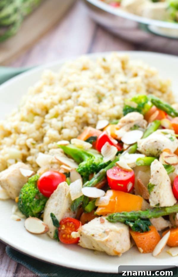 Chicken Asparagus Stir-Fry with Sweet Tomatoes and Crunchy Almonds 2 Quick and vibrant Spring Chicken Stir-Fry with tender chicken, crisp asparagus, and juicy cherry tomatoes, ready in 20 minutes.