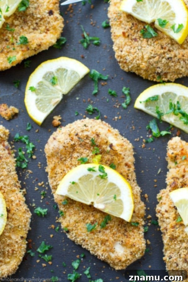 Irresistible Lemon-Garlic Crusted Chicken Tenders 5 Close-up of the textured breading on a chicken tender, showcasing the crispy coating.