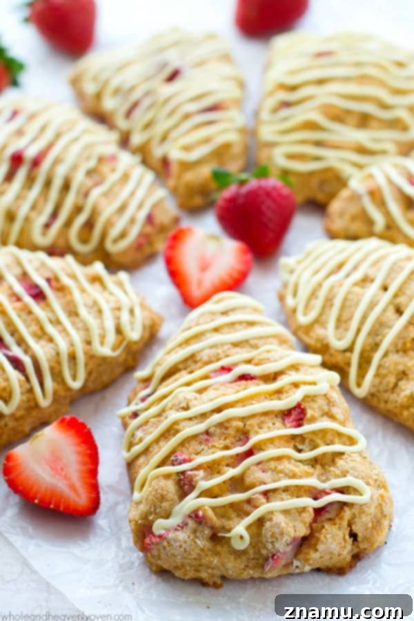 White Chocolate Strawberry Cream Scones 6 A selection of fluffy strawberry scones with white chocolate, perfect for a special brunch spread