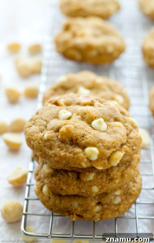 Soft and chewy white chocolate macadamia nut cookies baked with coconut oil, butter-free recipe