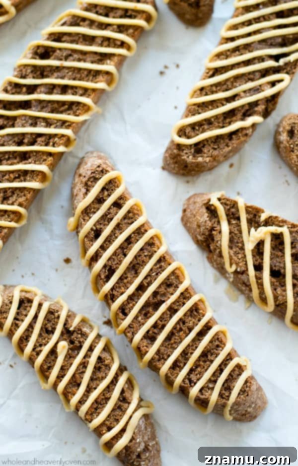 Up-close view of perfectly baked chocolate biscotti with a glistening peanut butter glaze, showcasing its delightful texture.