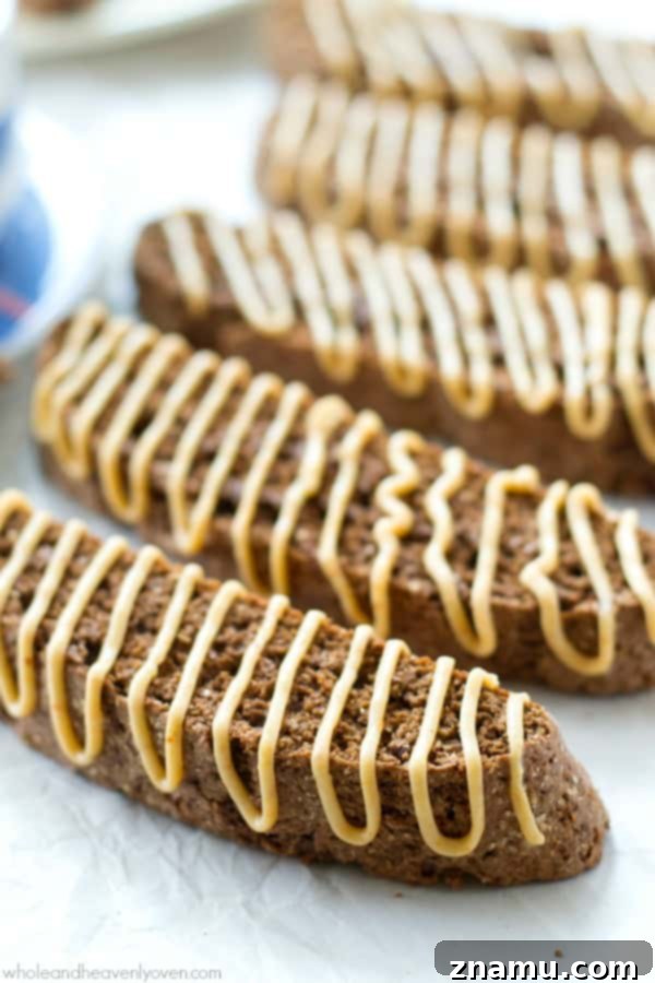 A close-up of the delicious chocolate biscotti, highlighting the rich cocoa color and the smooth, decadent peanut butter glaze.