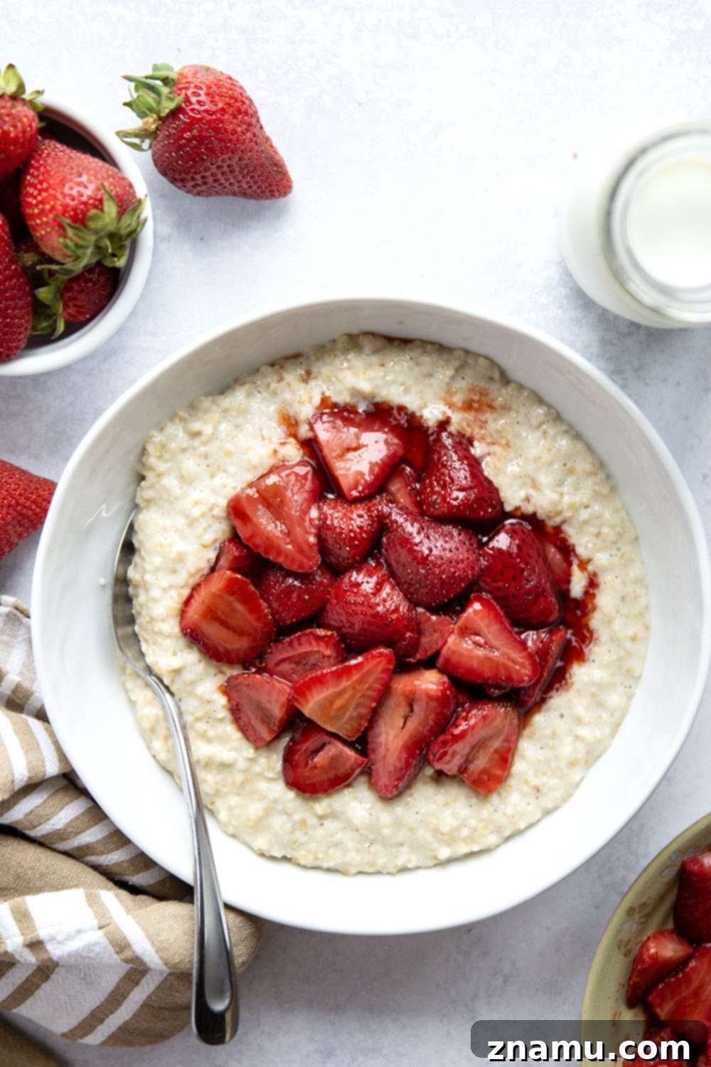 Maple roasted strawberries and creamy steel-cut oats are a match made in heaven with these easy strawberry steel-cut oats!