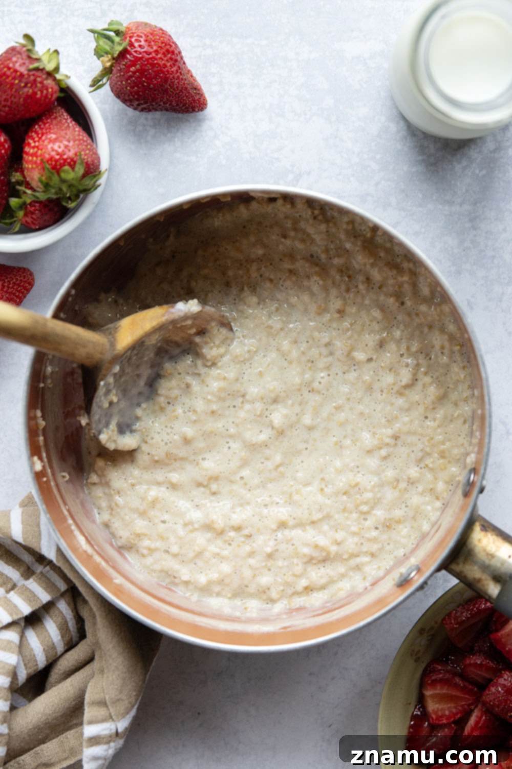 Maple roasted strawberries and creamy steel-cut oats are a match made in heaven with these easy strawberry steel-cut oats!
