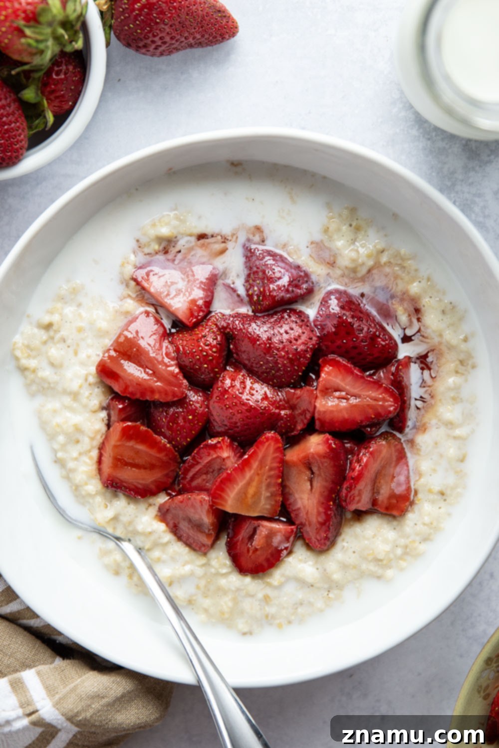 Maple roasted strawberries and creamy steel-cut oats are a match made in heaven with these easy strawberry steel-cut oats!