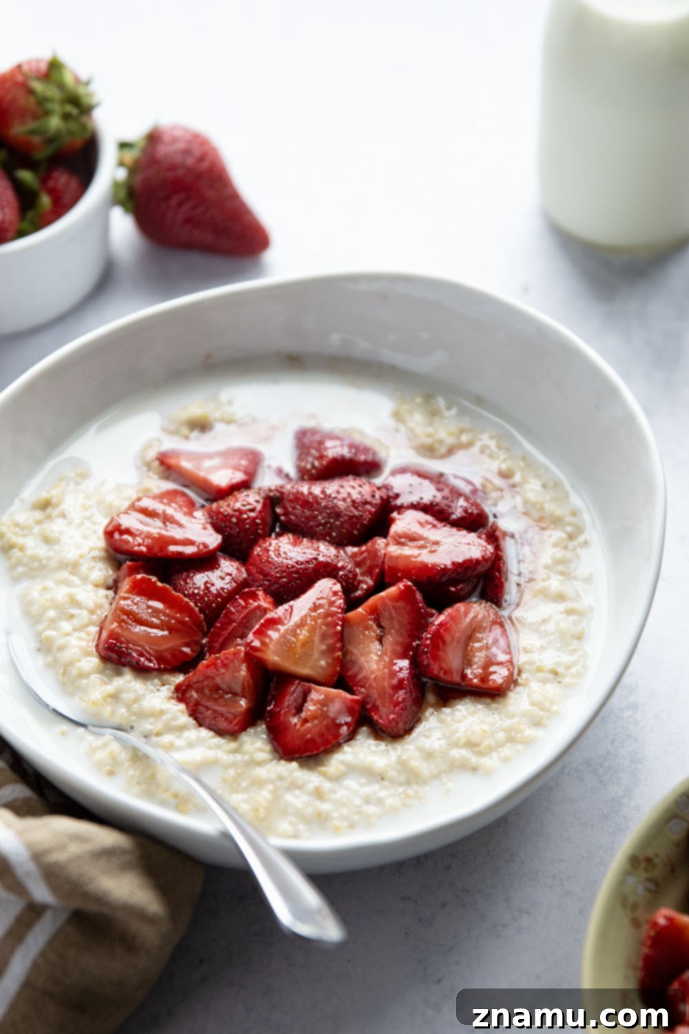 Maple roasted strawberries and creamy steel-cut oats are a match made in heaven with these easy strawberry steel-cut oats!