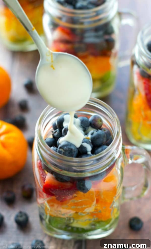 Turkey Burgers with Creamy Feta Spinach and Balsamic Glazed Onions 12 A vibrant rainbow fruit salad layered in a jar with a tangy citrus yogurt dressing, ideal for picnics.