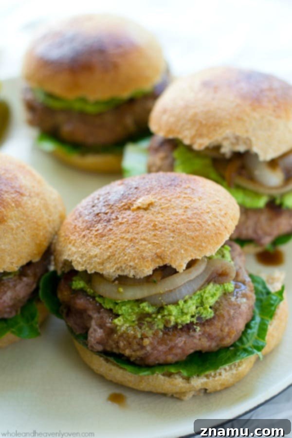 Turkey Burgers with Creamy Feta Spinach and Balsamic Glazed Onions 3 These juicy turkey burgers are perfect for summer parties, topped with creamy spinach whipped feta and savory caramelized onions.