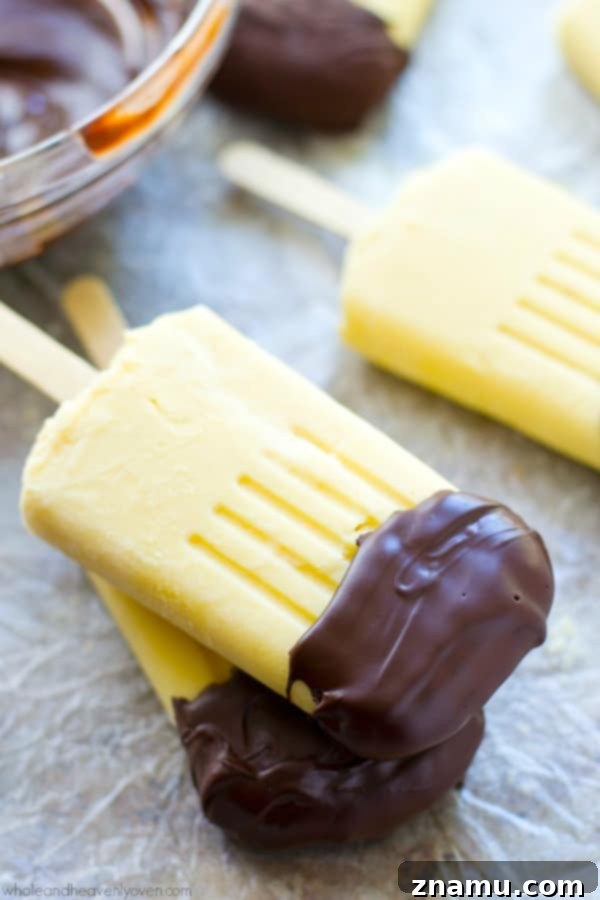 Vanilla Chocolate Pudding Pops 9 These creamy vanilla pudding popsicles are the perfect way to beat the heat this summer! Dipping them in melted chocolate makes them even more fun! @WholeHeavenly