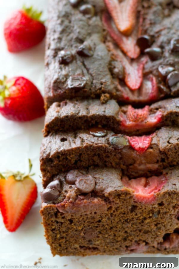 Decadent Double Chocolate Strawberry Banana Loaf 4 Fresh, vibrant strawberries, a key ingredient in Double Chocolate Strawberry Banana Bread.