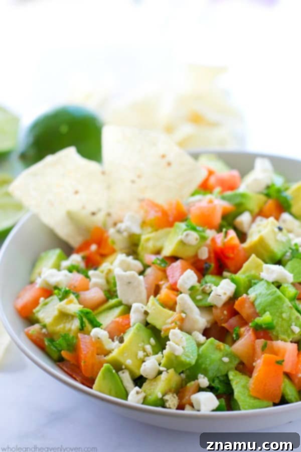 Robust Mediterranean Guacamole 7 Overview of a platter featuring Chunky Greek Guacamole and dippers
