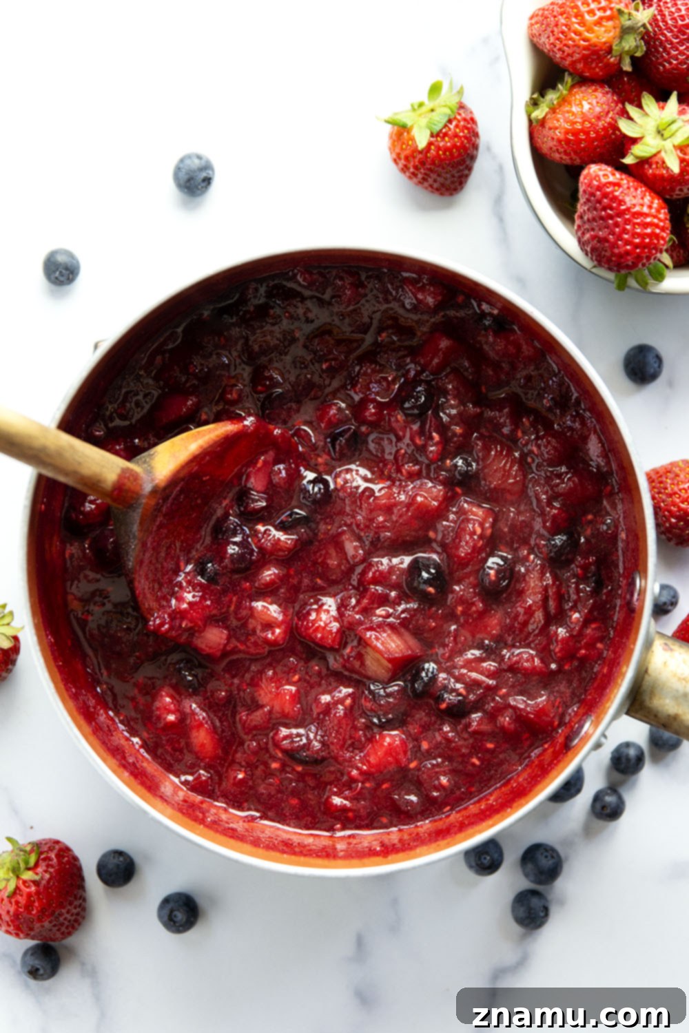 Tangy Rhubarb Berry Compote 3 Sweet, tangy and loaded with a triple dose of berries and lots of fresh rhubarb, this summery rhubarb berry sauce is amazing over pancakes, waffles, oatmeal, and even ice cream!