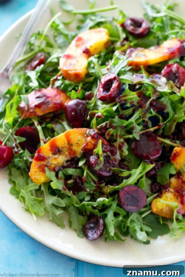 Golden Peach & Arugula with Ruby Balsam Elegance 4 Overhead shot of the grilled peach and arugula salad, artfully arranged before the dressing is added, emphasizing the natural beauty of the ingredients. @WholeHeavenly