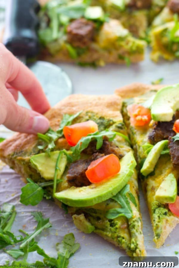 California Pesto Cheeseburger Pizza 8 Beautifully arranged slices of California-style pesto pizza on a serving board.