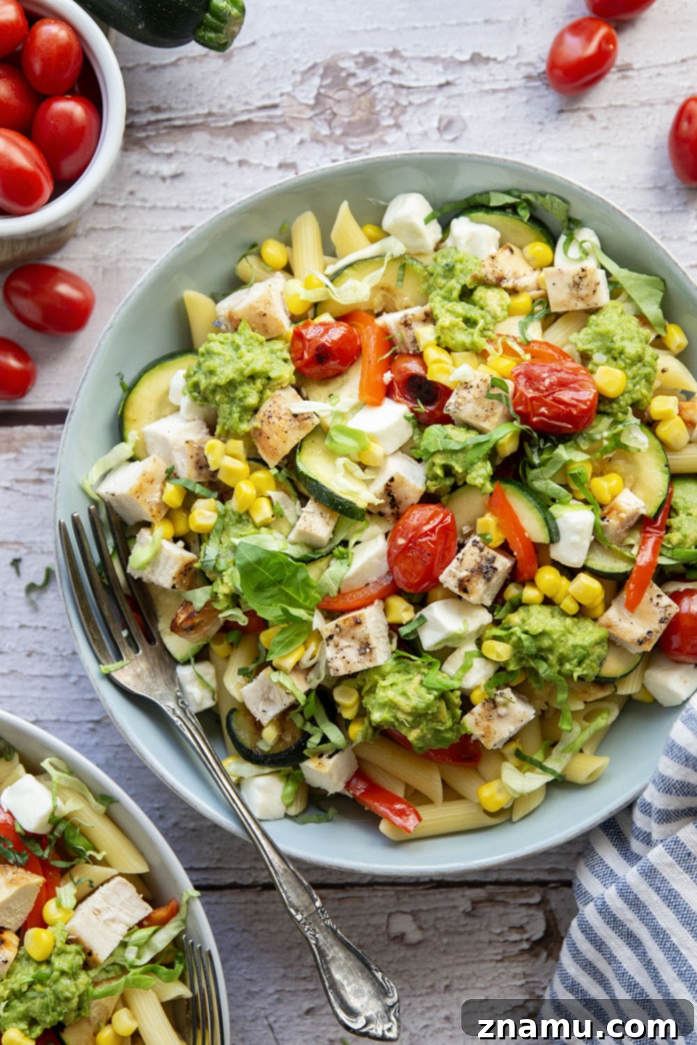 Grilled chicken and vegetables ready to be added to California pasta