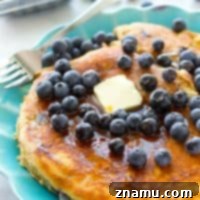 Colossal Buttermilk Blueberry Pancake 9 A perfectly cooked XXL blueberry buttermilk pancake.