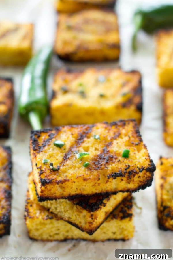 Honeyed Heat Griddle Cornbread 5 Slices of cornbread cut horizontally, ready to be buttered and grilled.