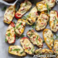 Fire-Kissed Sweet Pepper Bites 8 Grilled Sweet Pepper Poppers with 3 cheeses and pimentos.