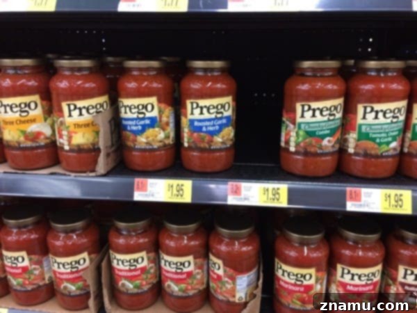 Ultimate Pepperoni Pizza Macaroni and Cheese 5 Assortment of Campbell's products including Prego Italian Sauce, Swanson Chicken Broth, SpaghettiO’s, and Pace Picante Sauce.