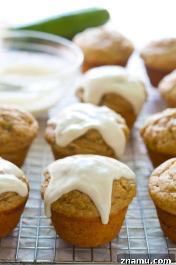 Glazed Zucchini Banana Muffins 5 A plate of freshly baked zucchini banana muffins