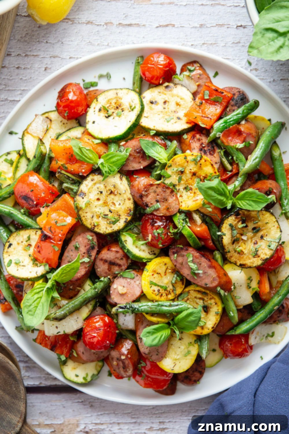 Zesty Marinated Grilled Summer Vegetables and Sausage 2 Vibrant Marinated Grilled Summer Vegetables and Sausage platter, perfect for a healthy and satisfying meal.