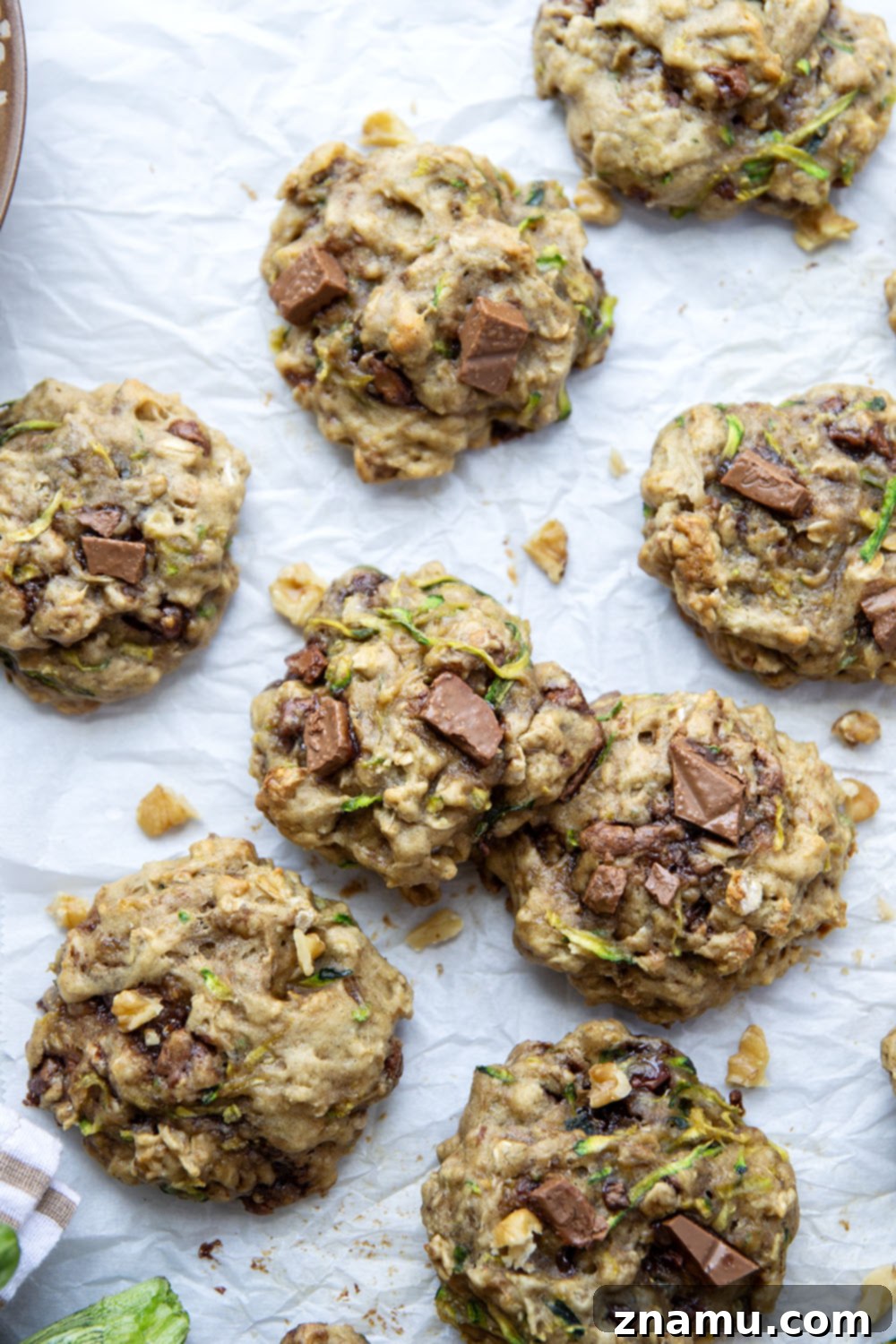 Wholesome Zucchini Breakfast Cookies 6 A delicious close-up of a Zucchini Breakfast Cookie with melted chocolate and oats.