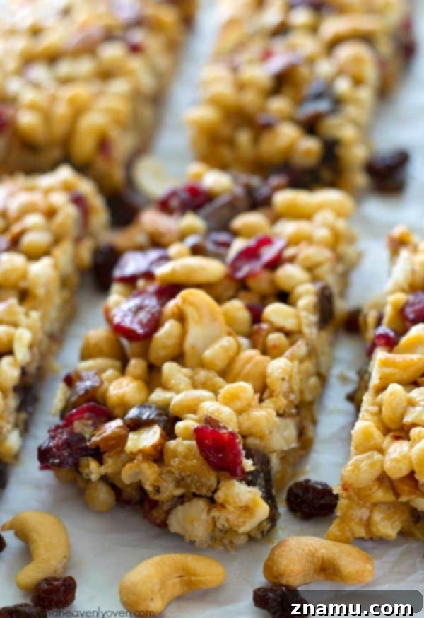 No-Bake Fruit and Nut Power Bars 3 Close-up of freshly made no-bake fruit and nut bars, showcasing their wholesome ingredients and appealing texture.