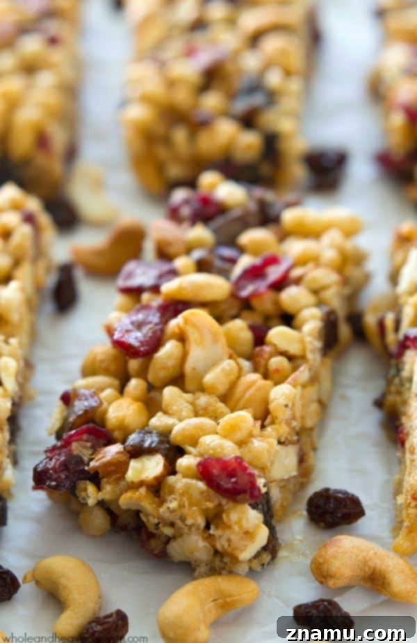 No-Bake Fruit and Nut Power Bars 5 A vibrant mix of crispy rice cereal, various nuts, and dried fruits, showcasing the key wholesome ingredients for these bars.