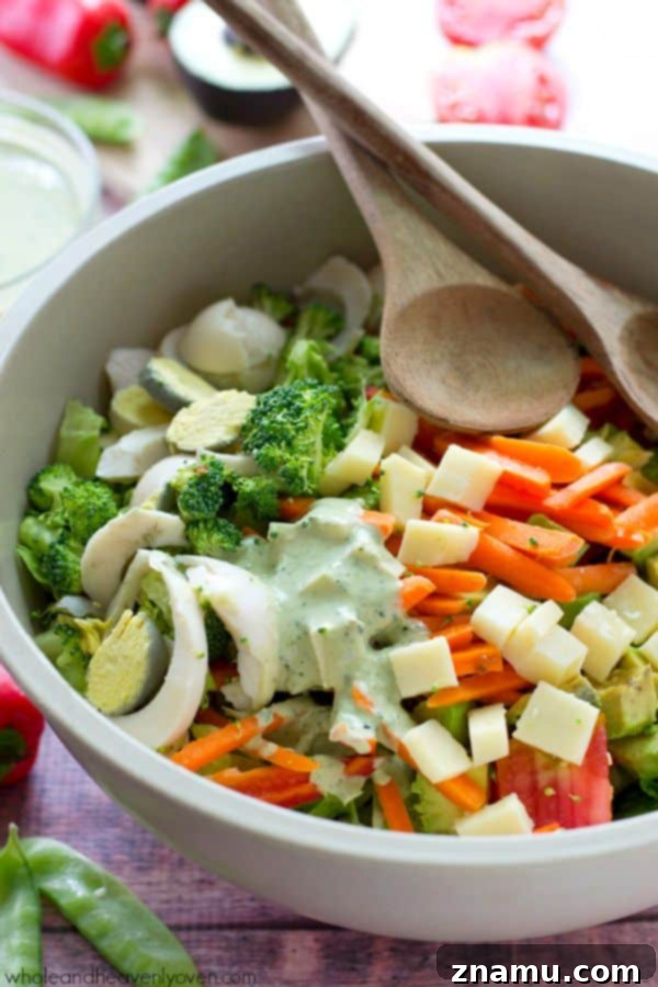 Overhead shot of the colorful Chef's Salad, highlighting fresh ingredients and rich dressing.
