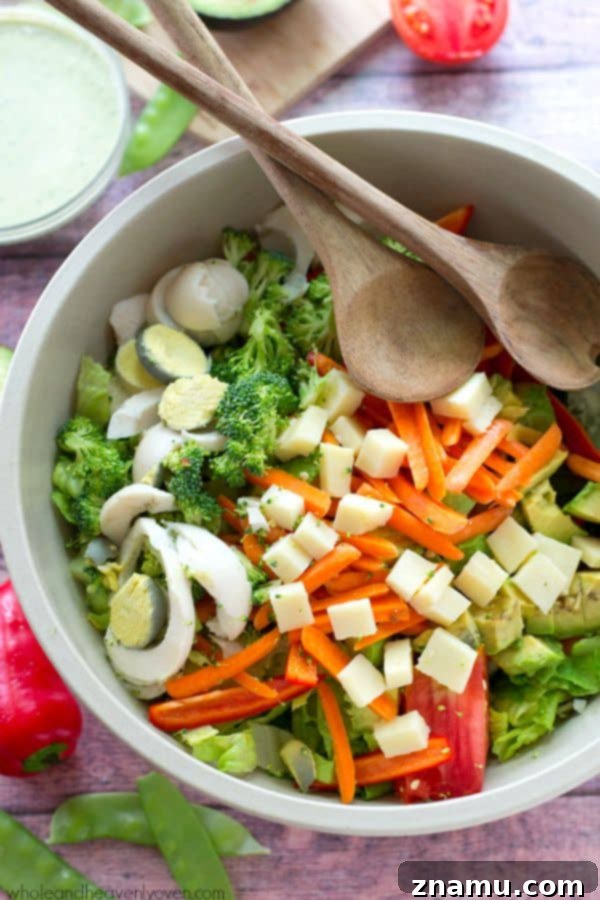 Close-up of the fresh summer vegetables in the Chef's Salad, showing crisp textures.