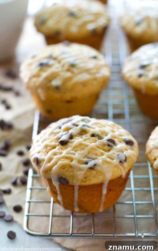 Cinnamon Roll Surprise Chocolate Chip Muffins 4 Stack of Cinnamon Roll-Stuffed Chocolate Chip Muffins with glaze