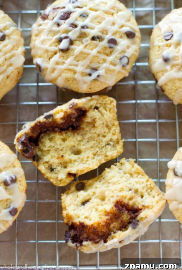 Cinnamon Roll Surprise Chocolate Chip Muffins 5 Top-down view of a single Cinnamon Roll-Stuffed Chocolate Chip Muffin
