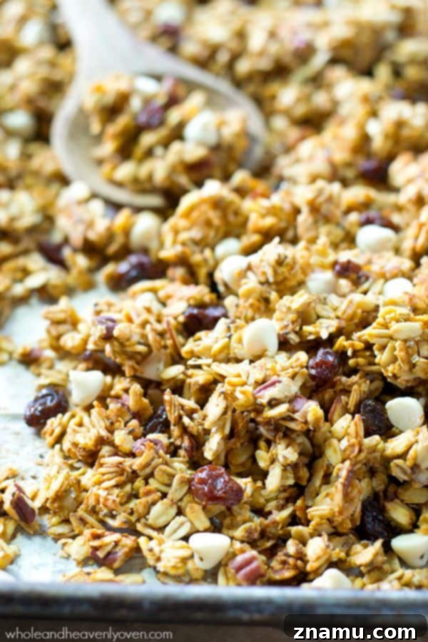 This crisp, cluster-y granola has a delightful fall twist of pumpkin, white chocolate, dried cranberries, and plenty of spice.---You'll want to eat it by the handful! @WholeHeavenly