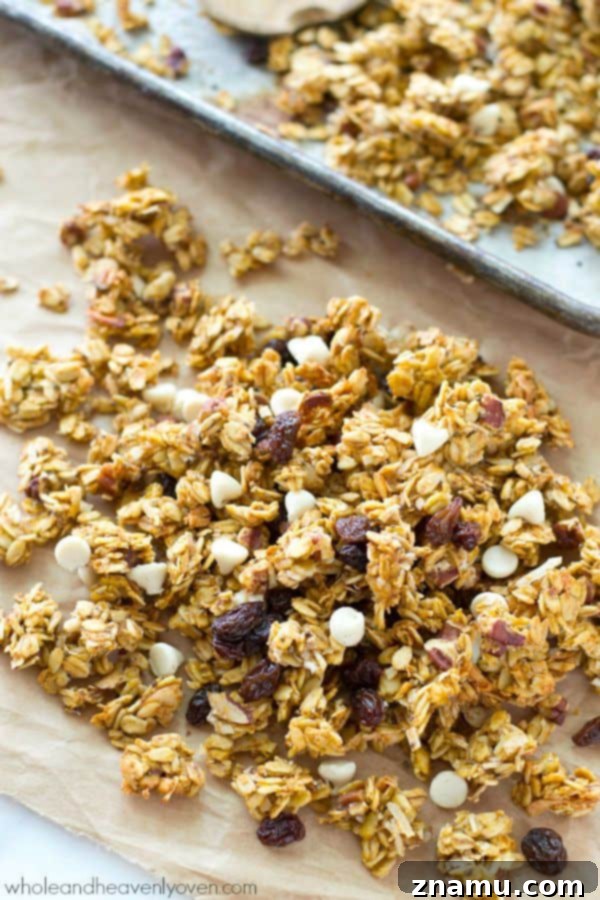 This crisp, cluster-y granola has a delightful fall twist of pumpkin, white chocolate, dried cranberries, and plenty of spice.---You'll want to eat it by the handful! @WholeHeavenly