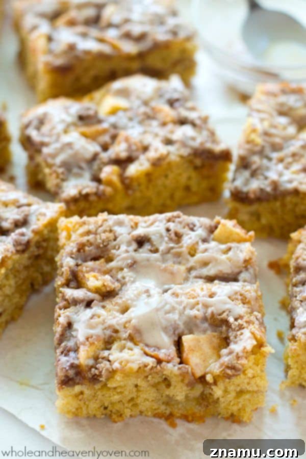 Unbelievably moist and loaded with apples, plenty of streusel, and glaze, you'll definitely savor every last crumb of this ultimate fall coffee cake! @WholeHeavenly
