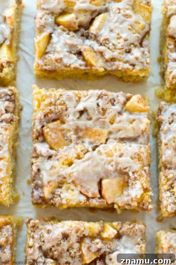 Unbelievably moist and loaded with apples, plenty of streusel, and glaze, you'll definitely savor every last crumb of this ultimate fall coffee cake! @WholeHeavenly